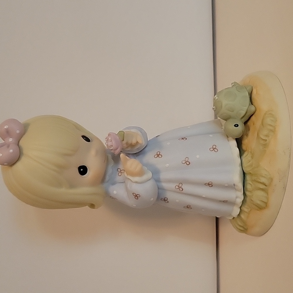 "The Lord Can Dew Anything" Precious Moments figurine.